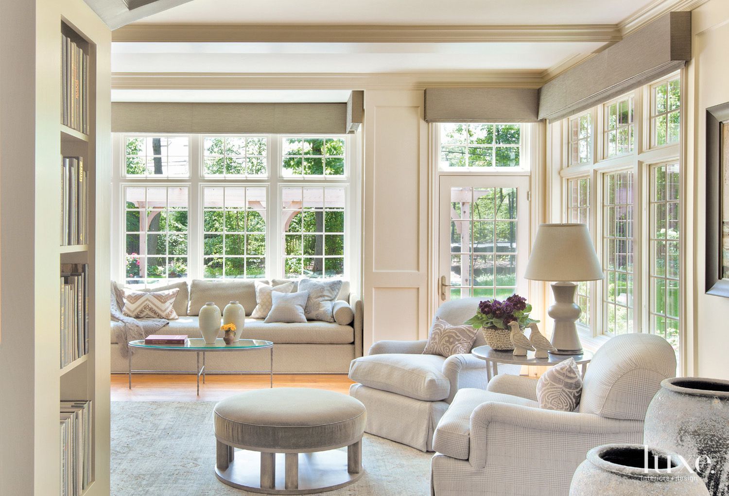 Transitional Cream Family Room with French Windows Luxe Interiors